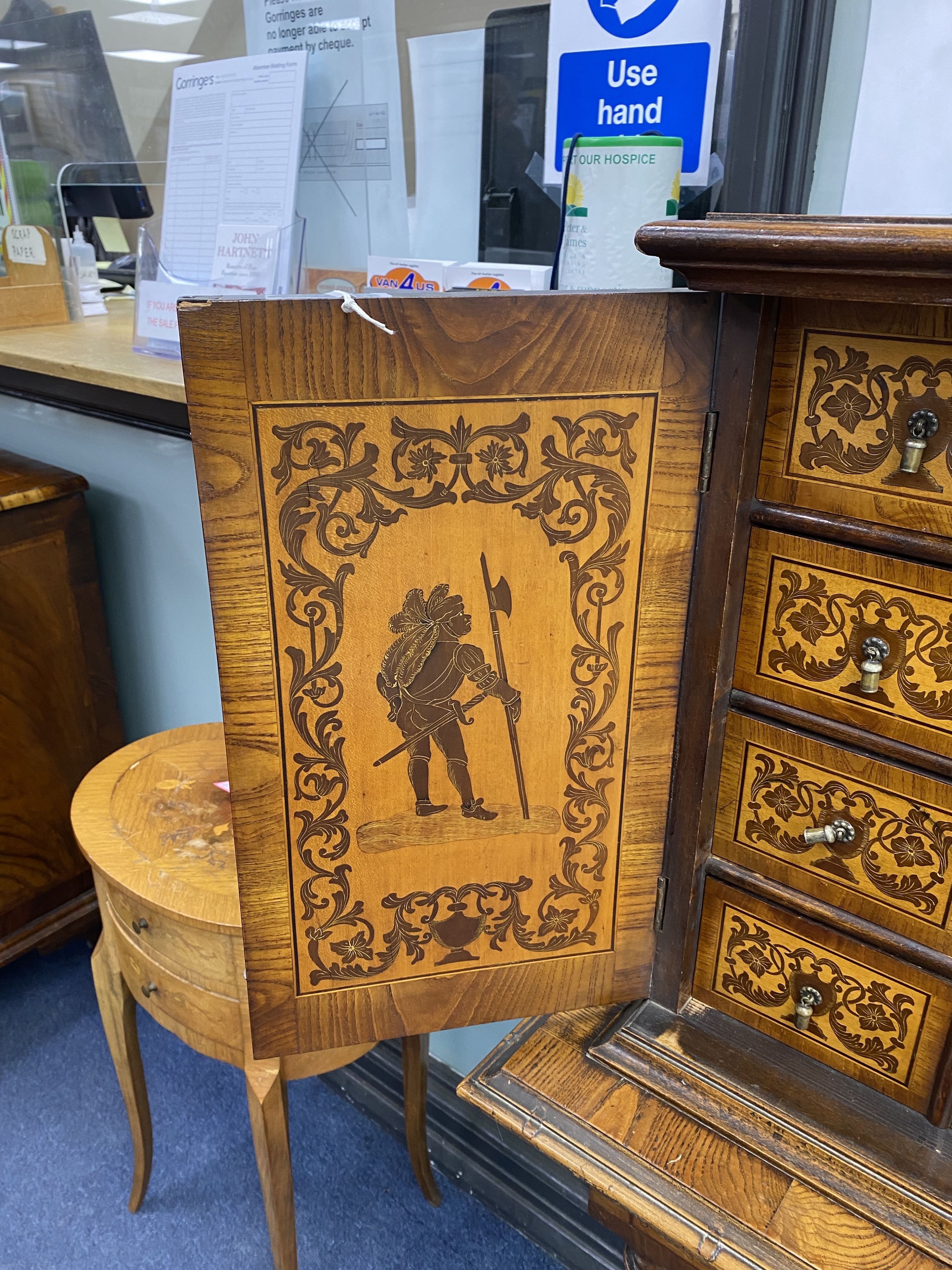 A Continental marquetry cabinet on stand, width 65cm, depth 36cm, height 126cm